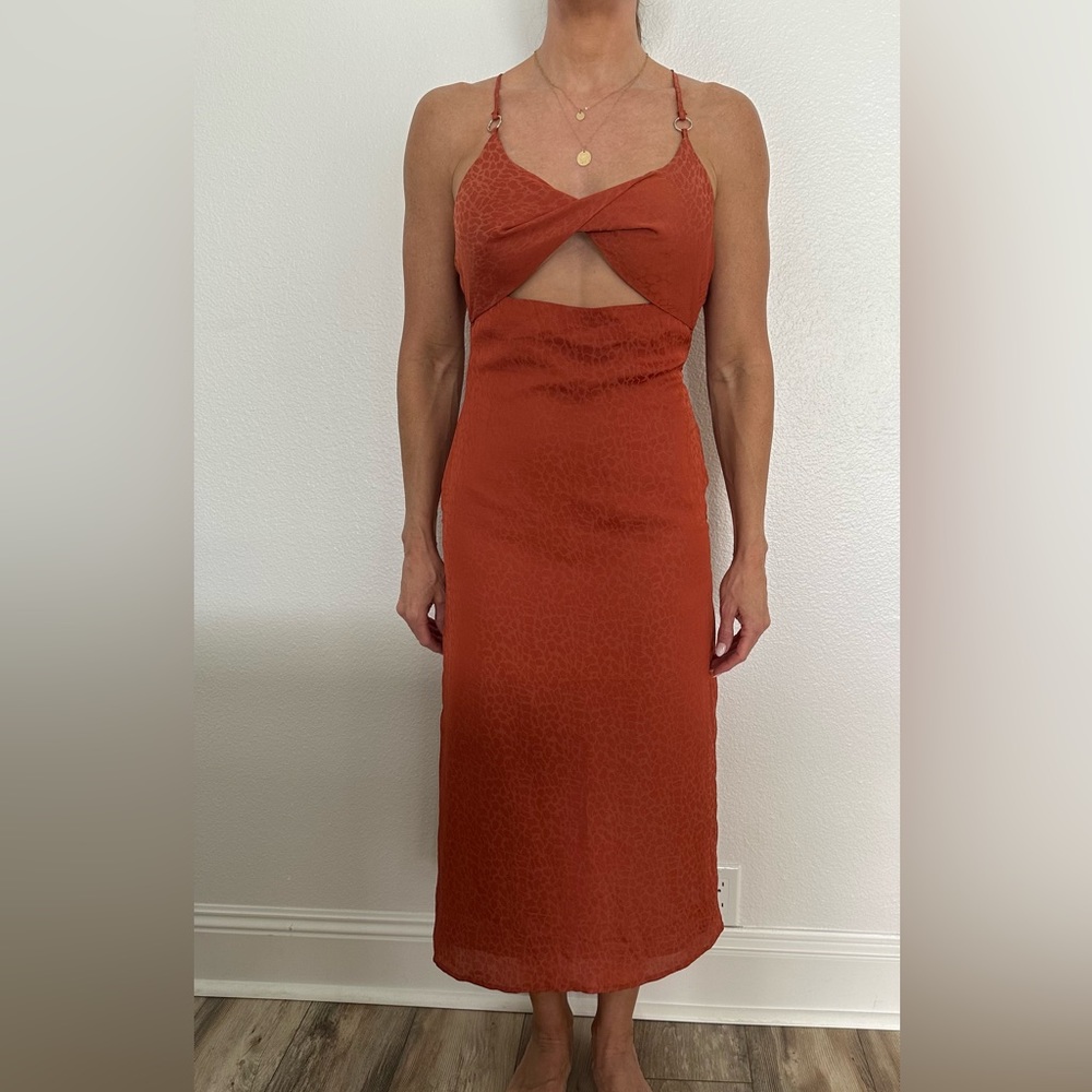 Rust color midi dress size M with cut outs